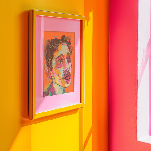 Vibrant digital portrait of a person with angular features against a bright orange background. The face is composed of bold, colorful lines and shapes in various hues including purple, yellow, pink, and teal. The subject has tousled dark hair and a contemplative expression, with prominent eyes and lips. The style is reminiscent of expressive, contemporary digital art.